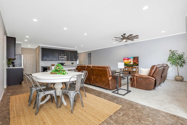 dining room with recessed lighting, beverage cooler, light colored carpet, baseboards, and crown molding