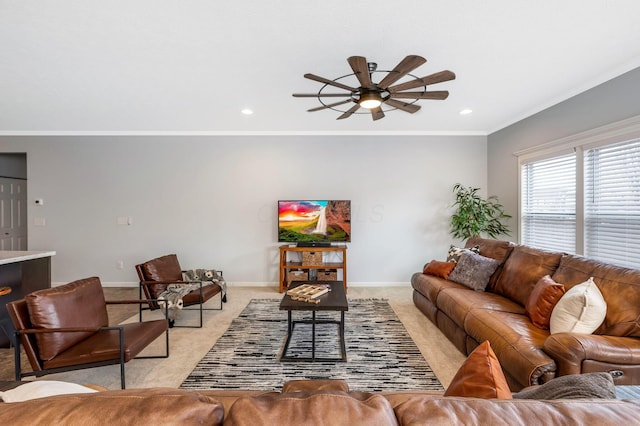 living room featuring recessed lighting, ornamental molding, a ceiling fan, light carpet, and baseboards