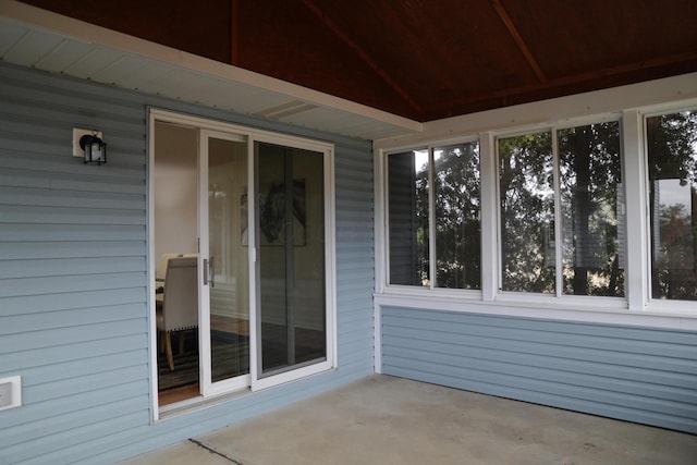 unfurnished sunroom featuring plenty of natural light