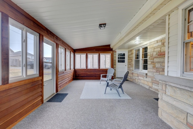 sunroom / solarium with lofted ceiling