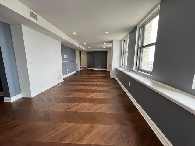 interior space featuring visible vents, baseboards, and recessed lighting