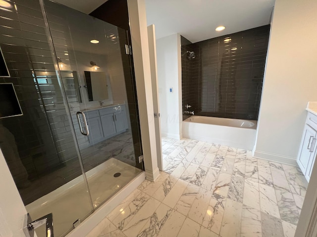 full bath featuring marble finish floor, vanity, a shower stall, and a bath