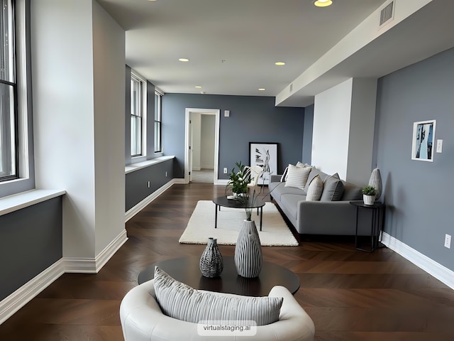 living room with recessed lighting, dark wood-style flooring, visible vents, and baseboards