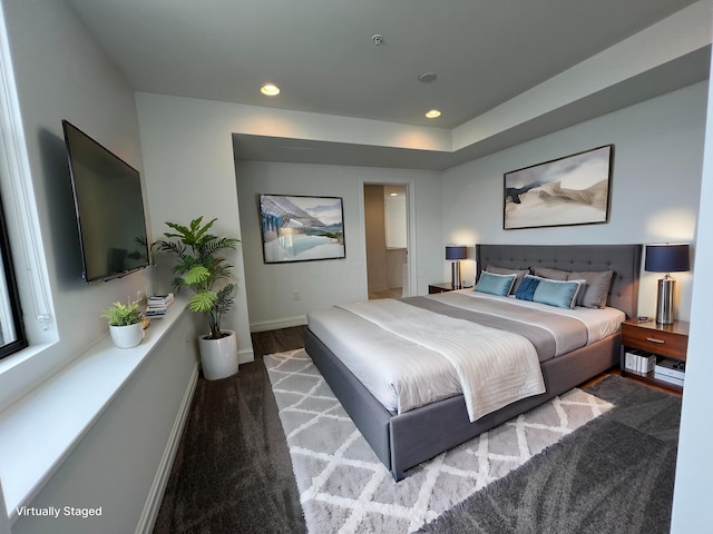 bedroom featuring baseboards and recessed lighting