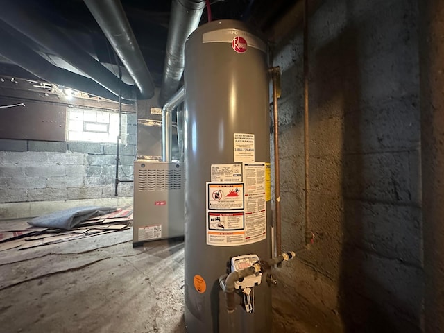 utility room featuring water heater