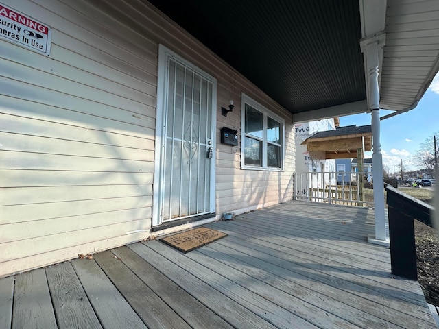 deck featuring covered porch