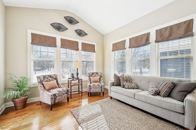 sunroom / solarium with vaulted ceiling