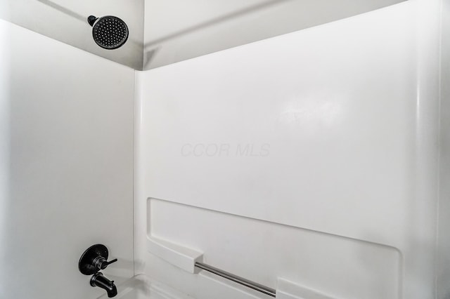 details with shower / bath combination