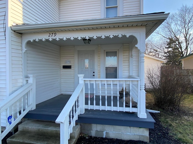 doorway to property featuring a porch