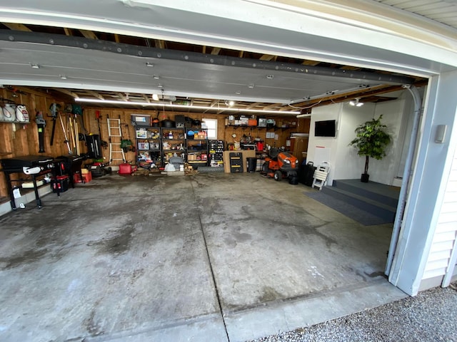 garage with a workshop area