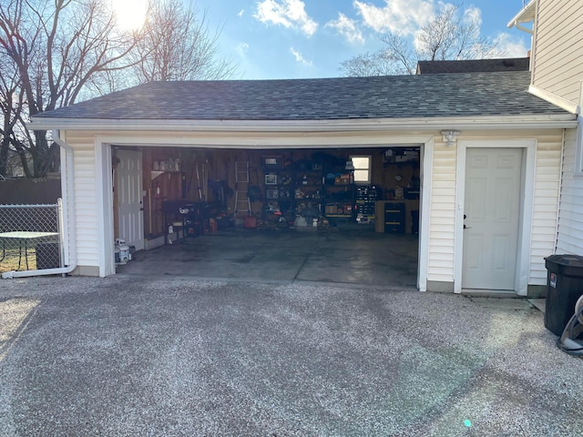 detached garage with fence