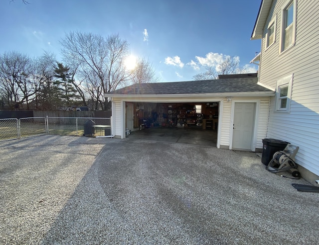 garage with fence