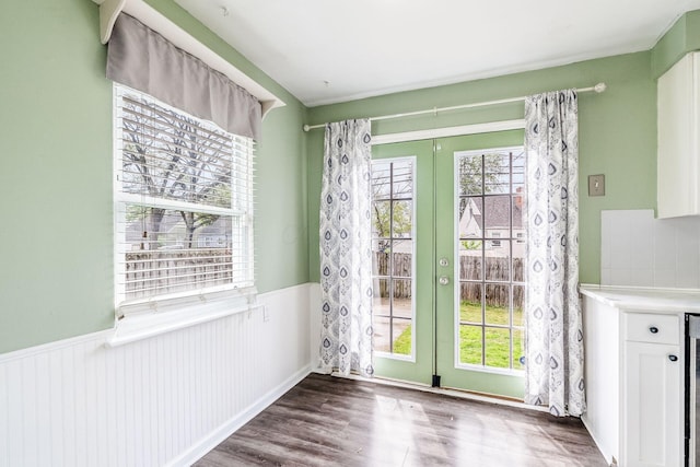 3093 Hamilton Ave, Columbus, OH 43224 - doorway featuring wainscoting, french doors, and dark wood finished floors