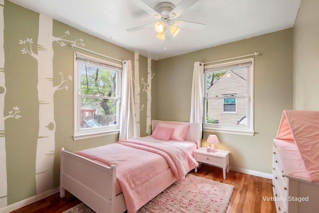 3093 Hamilton Ave, Columbus, OH 43224 - bedroom featuring wood-type flooring, baseboards, and ceiling fan