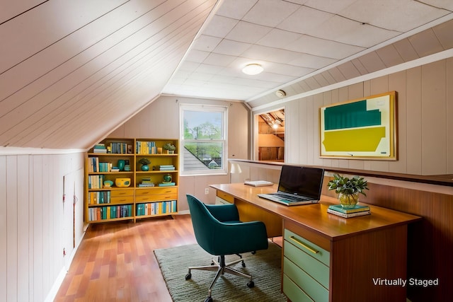 3093 Hamilton Ave, Columbus, OH 43224 - home office featuring wood walls, lofted ceiling, and wood finished floors