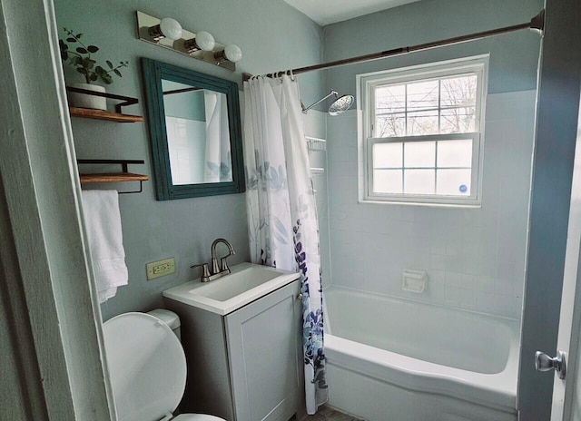 3093 Hamilton Ave, Columbus, OH 43224 - bathroom featuring a sink, shower / bath combo, and toilet