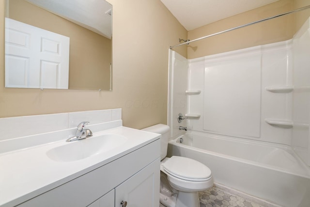 full bathroom featuring a textured ceiling, vanity, toilet, and shower / bathtub combination