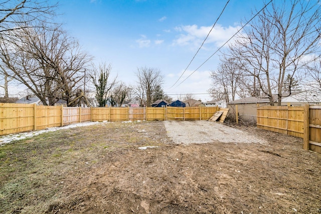 view of yard with a fenced backyard