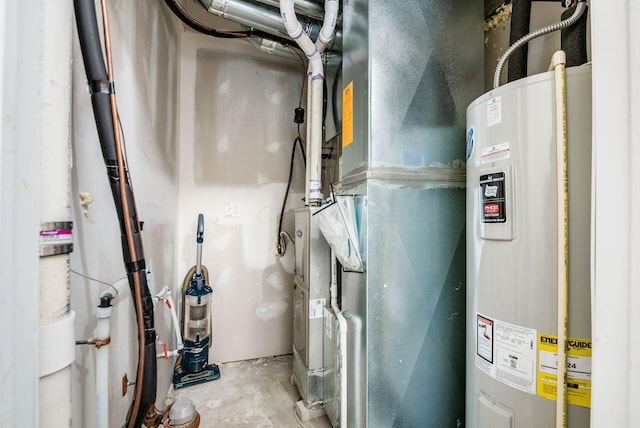 utility room featuring water heater