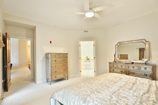 bedroom with connected bathroom, light colored carpet, crown molding, and visible vents