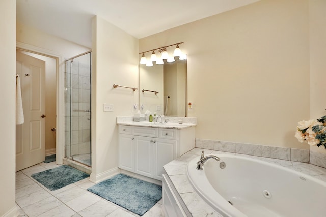 bathroom featuring a jetted tub, a shower stall, and vanity