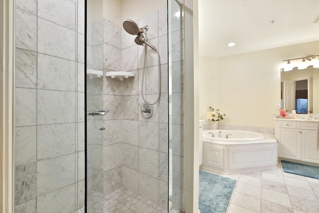 full bath with vanity, a shower stall, a bath, and tile patterned floors