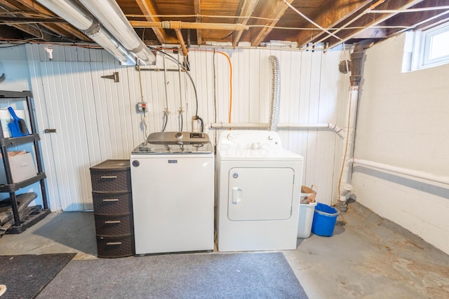 washroom with laundry area and washing machine and clothes dryer