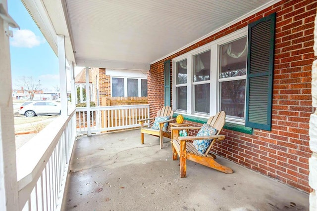 balcony featuring a porch