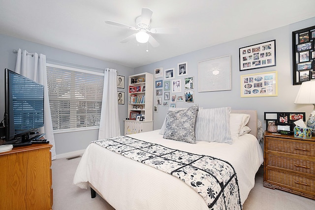 bedroom with a ceiling fan, carpet, visible vents, and baseboards