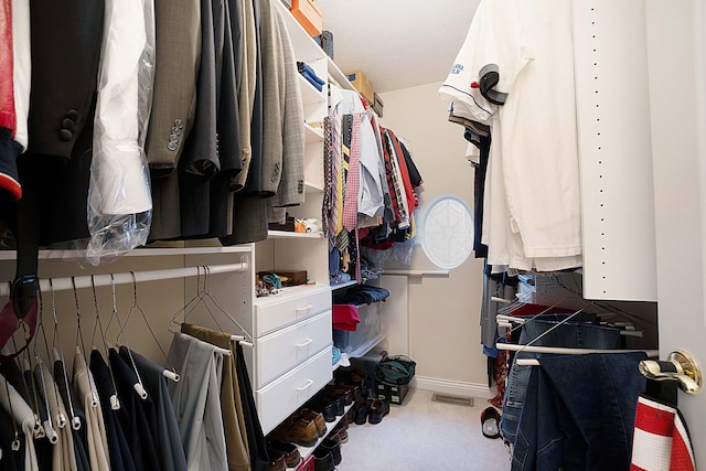 walk in closet with visible vents