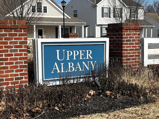 view of community sign