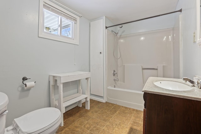 full bath featuring shower / bathing tub combination, vanity, and toilet