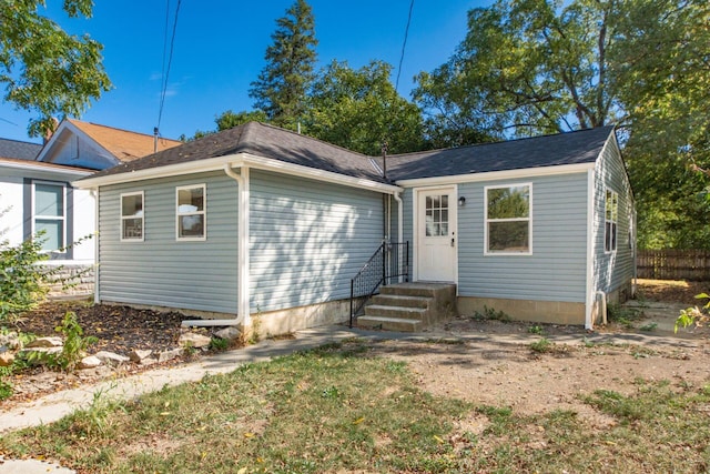 view of front of home with fence