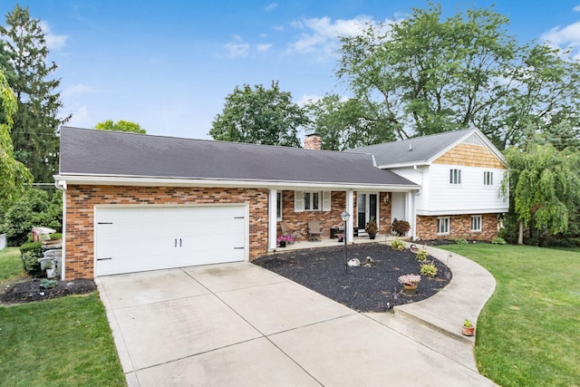 split level home featuring an attached garage, concrete driveway, roof with shingles, a front lawn, and a chimney