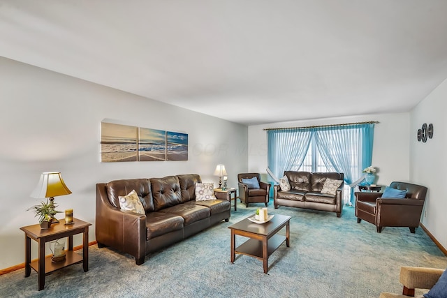 living area with carpet flooring and baseboards