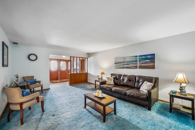 living room with carpet floors and baseboards