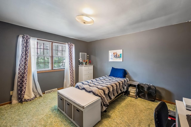 bedroom featuring light carpet, visible vents, and baseboards