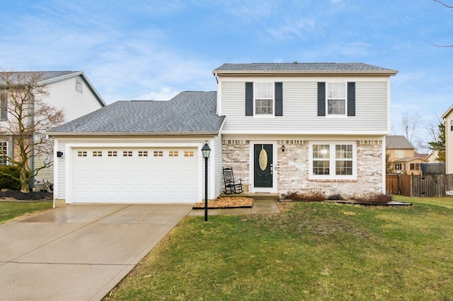 view of front of house with an attached garage, brick siding, fence, driveway, and a front lawn