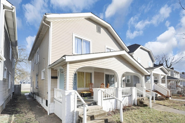 view of front of property featuring covered porch