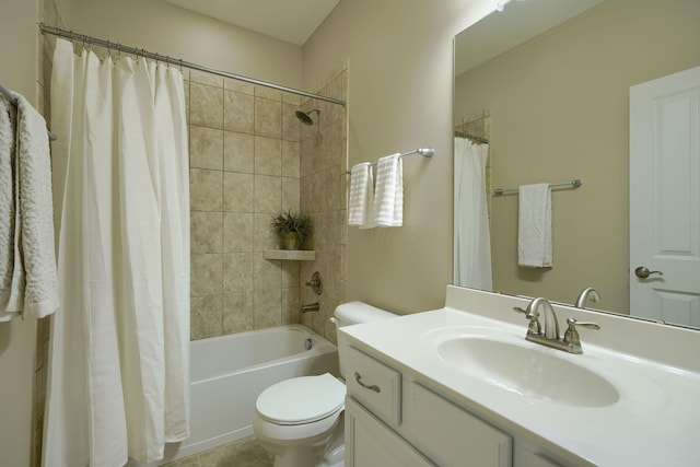 bathroom featuring toilet, shower / bath combo, and vanity