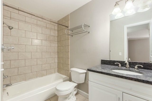 full bathroom featuring vanity, baseboards, tile patterned flooring, bathing tub / shower combination, and toilet