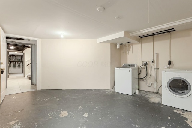 washroom featuring laundry area and independent washer and dryer