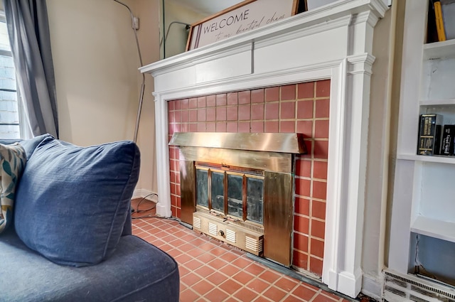 interior space featuring a fireplace with flush hearth