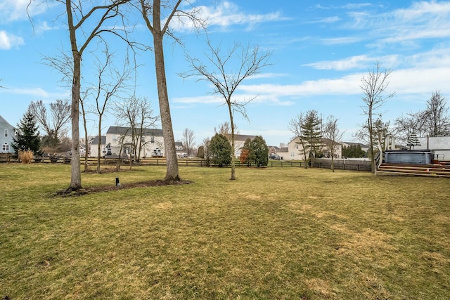 view of yard featuring fence