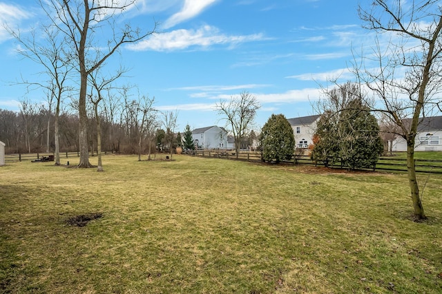 view of yard with fence