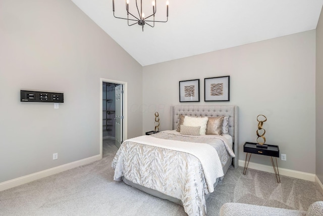 carpeted bedroom with high vaulted ceiling, a notable chandelier, and baseboards