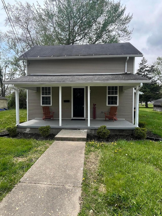 15 Fent St, Jeffersonville, OH 43128 - view of front of house with covered porch and a front lawn