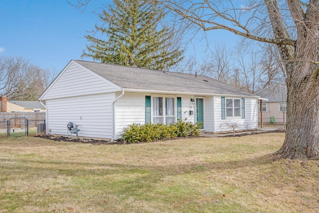 single story home featuring roof with shingles, a gate, fence, and a front yard