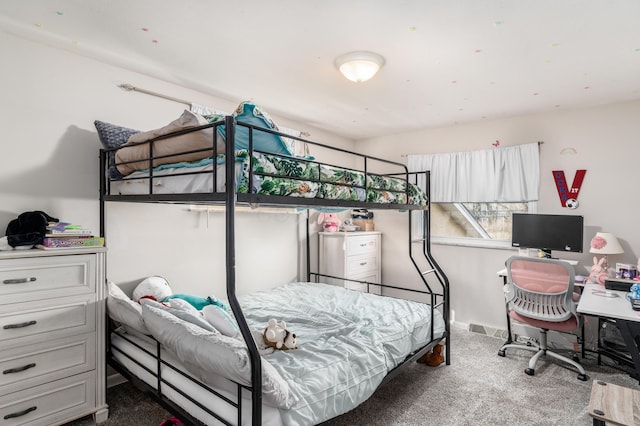 carpeted bedroom with baseboards