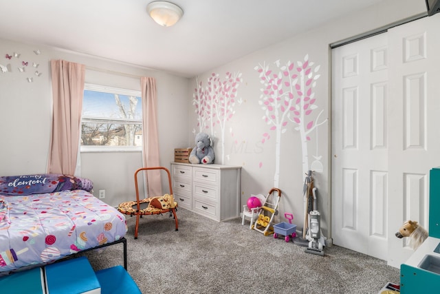 bedroom featuring carpet flooring